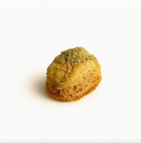 Kol O Shkor W/ Cashews $39.00 Traditional kol w shkor baklava: crisp layers of phyllo rolled with cashews and finished with light syrup.