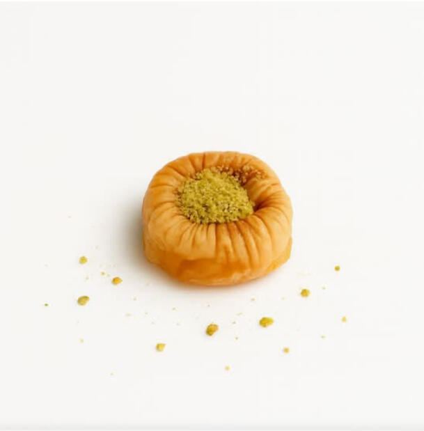 Swar W/ Pistachios $46.00 Ring-shaped baklawa of flaky phyllo, filled with crushed pistachios.