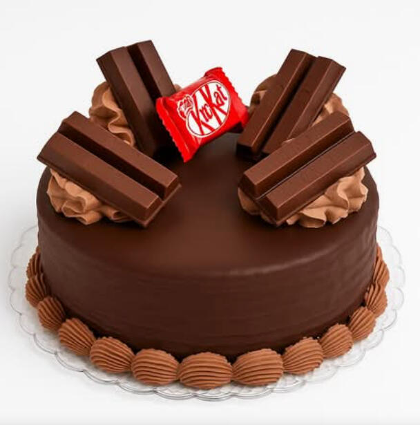 KitKat Cake (10 inches) $62.99 Chocolate cake covered in chocolate icing, topped with KitKat bars and piped chocolate swirls.