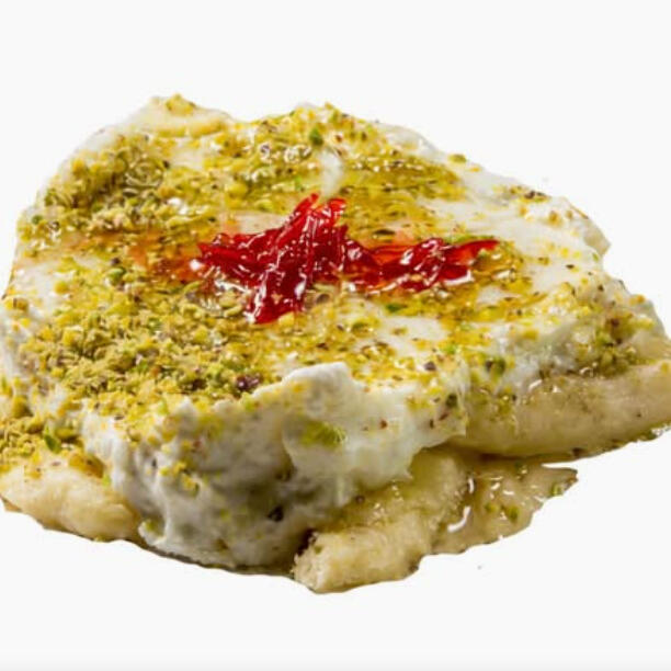 Cheese Halawa (Regular) $36.00 Cheese dough filled with cream, drizzled with syrup, topped with crushed pistachios. Regular portion.