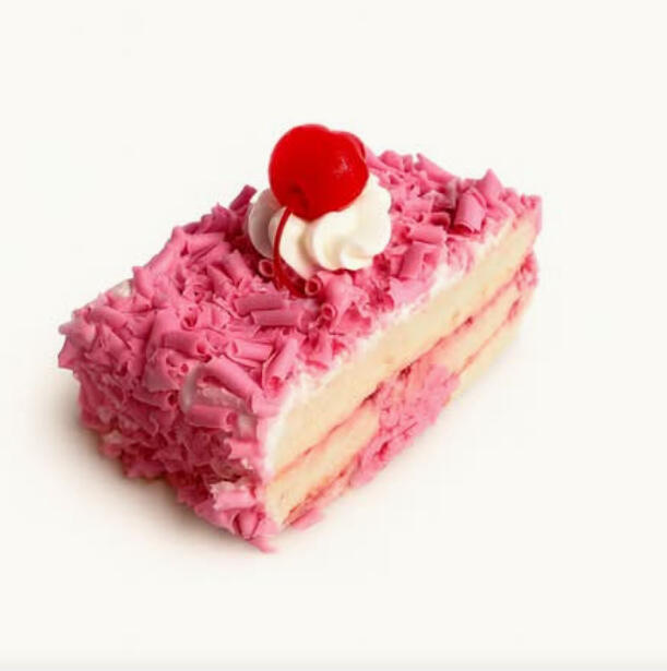 Strawberry Cake Slice $7.49 Two-layer strawberry cake with cream filling, coated in pink curls and finished with whipped cream and a cherry.