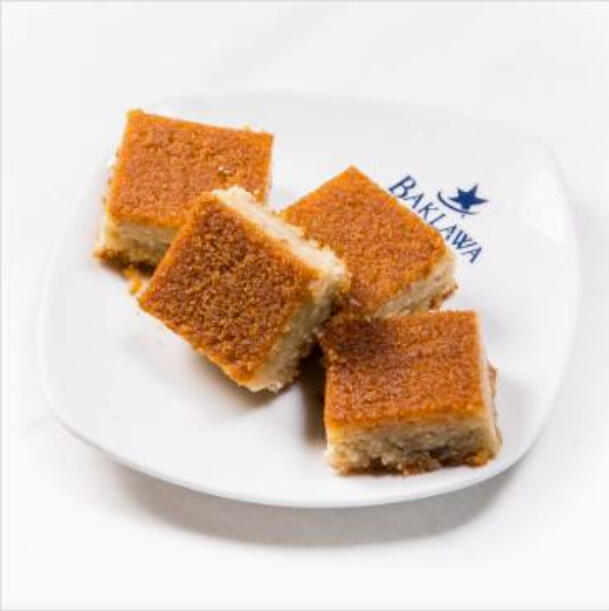 Nammoura $34.00 Traditional Middle Eastern semolina cake soaked in syrup, baked to a golden crust and cut into small squares.