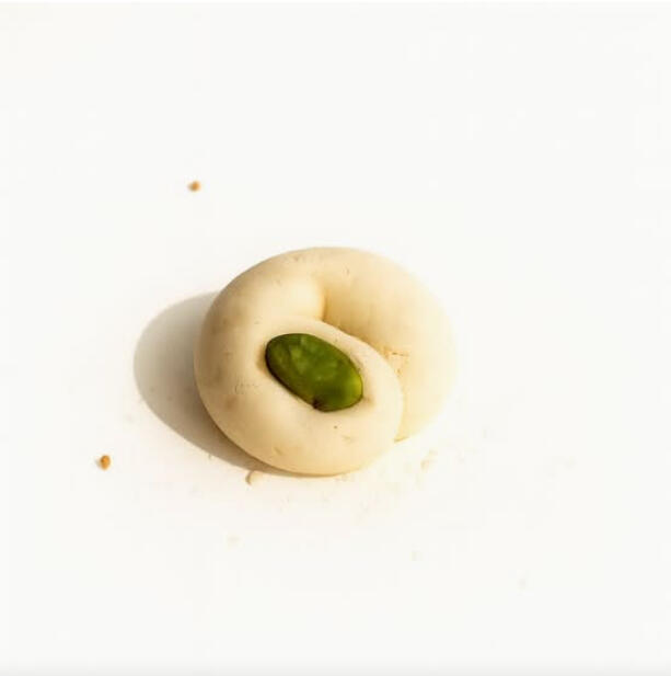 Ghoraybeh (Butter Cookies) $36.00 Buttery Middle Eastern shortbread cookie, tender and crumbly, shaped into a ring and finished with a single pistachio.