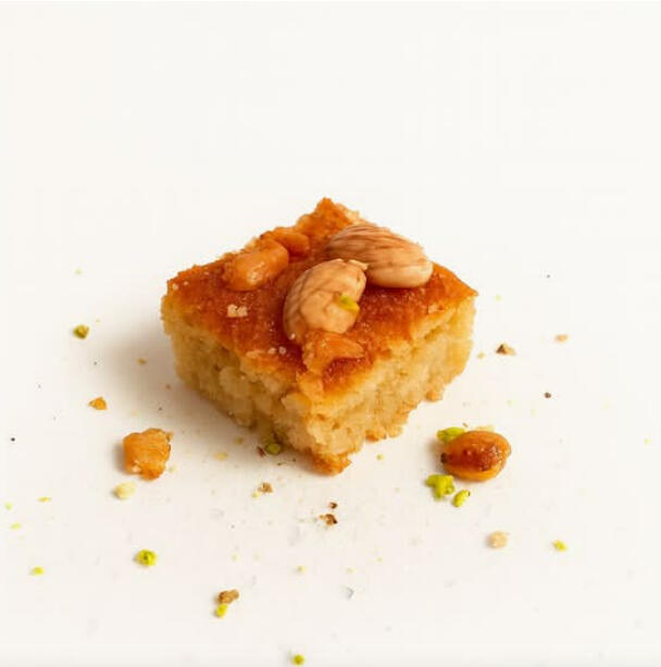 Nammoura (Nuts) $36.00 Traditional semolina cake soaked in syrup and topped with nuts.